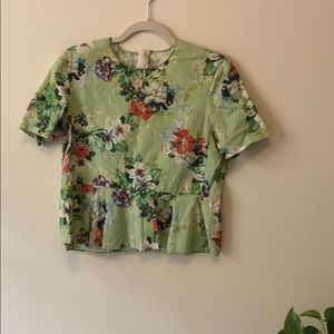 Green flowered peplum top